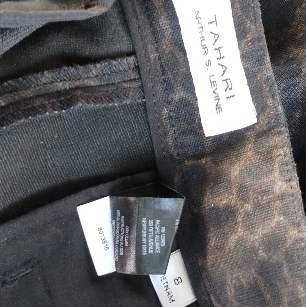 Used women's dress pants with leopard print size 8